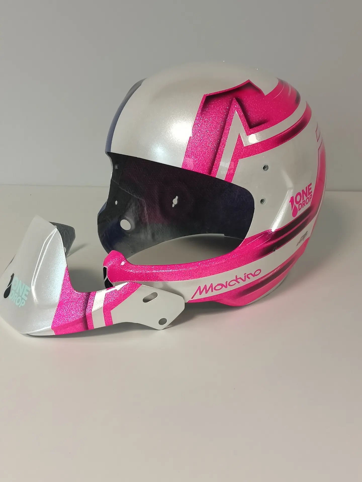 Casco Stilo WRC Filippo Marchino fucsia con logo One Drop